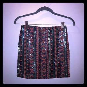 Francesca’s sequined miniskirt w/ Aztec pattern